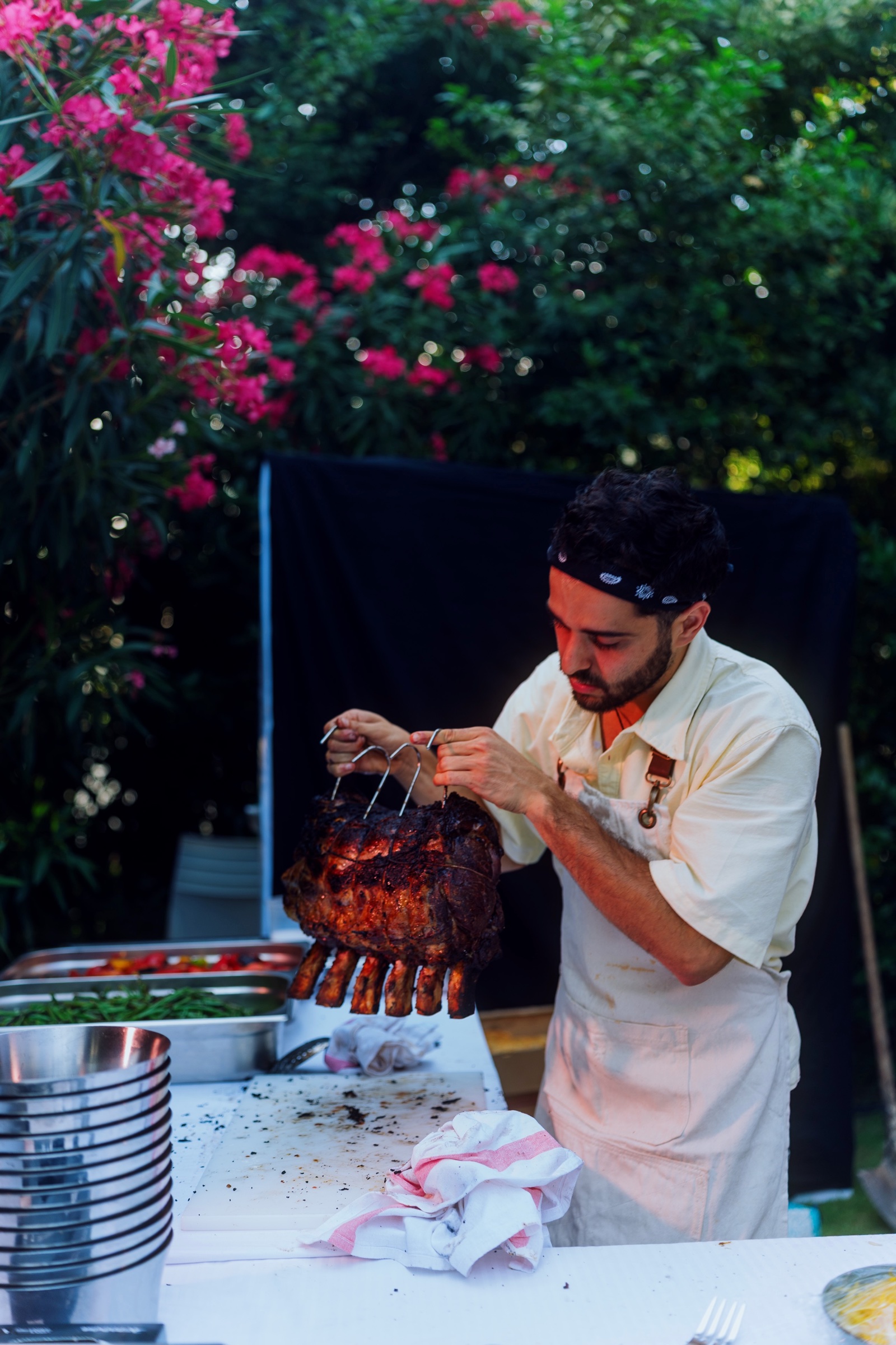 A chef preparing food in the garden