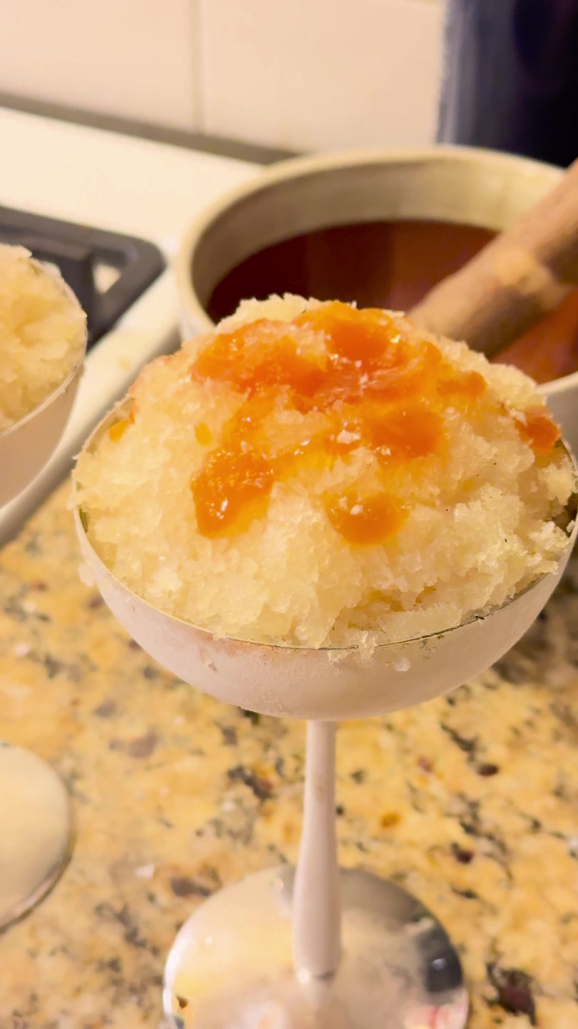 Apple granita with honey served in a stemmed cup