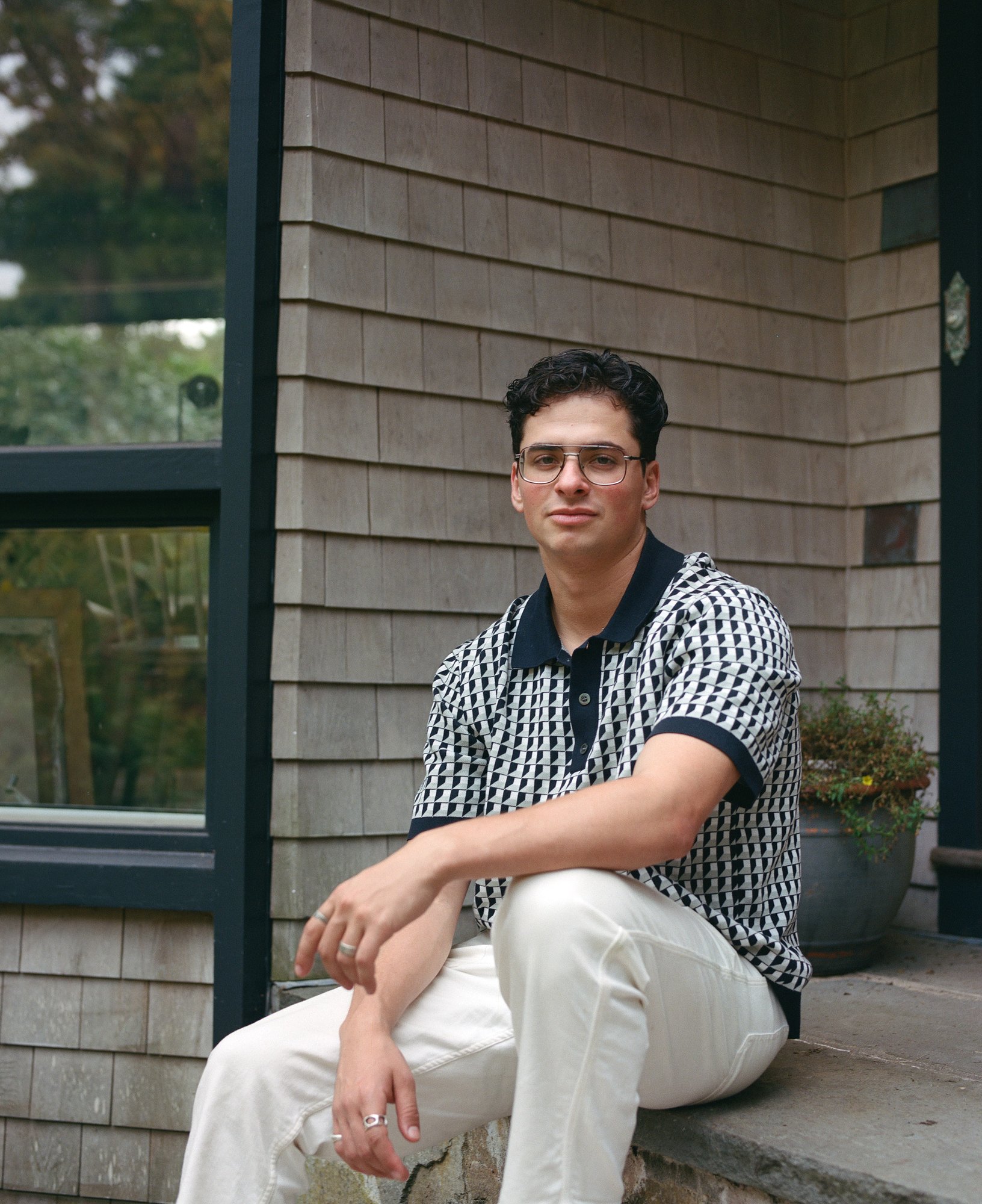 A guest seated on the front steps