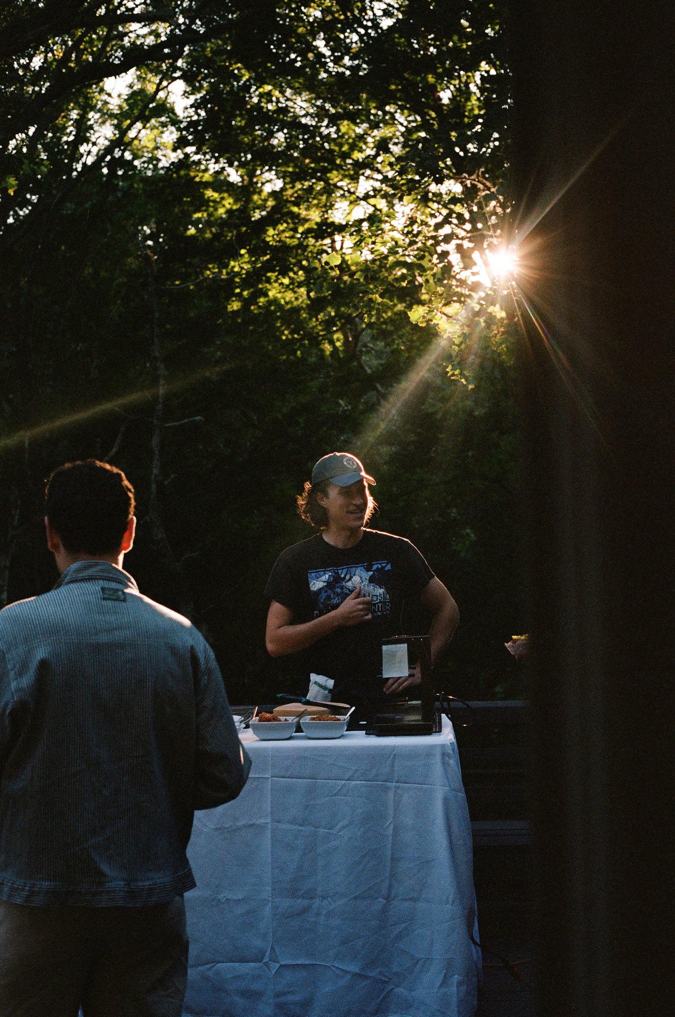 Food preparation in the late afternoon sunlight