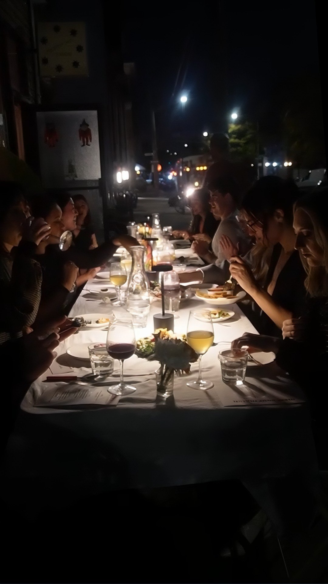 An intimate dinner table after dark