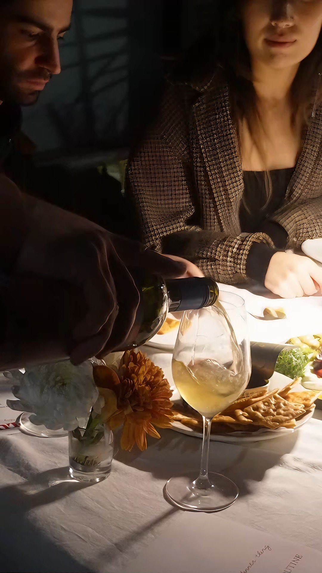Guests sharing food around the table