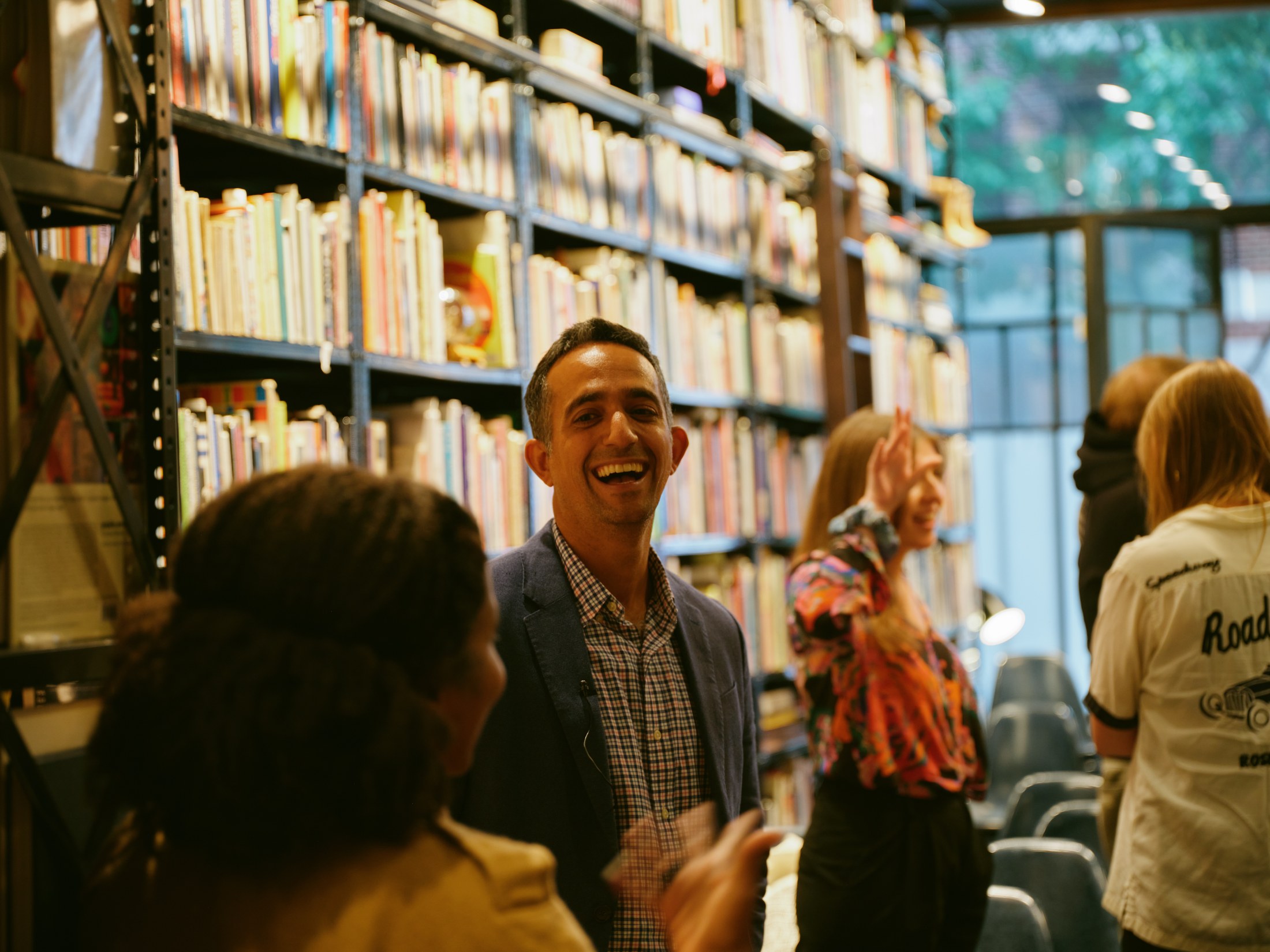 Guests sharing a laugh before the conversation